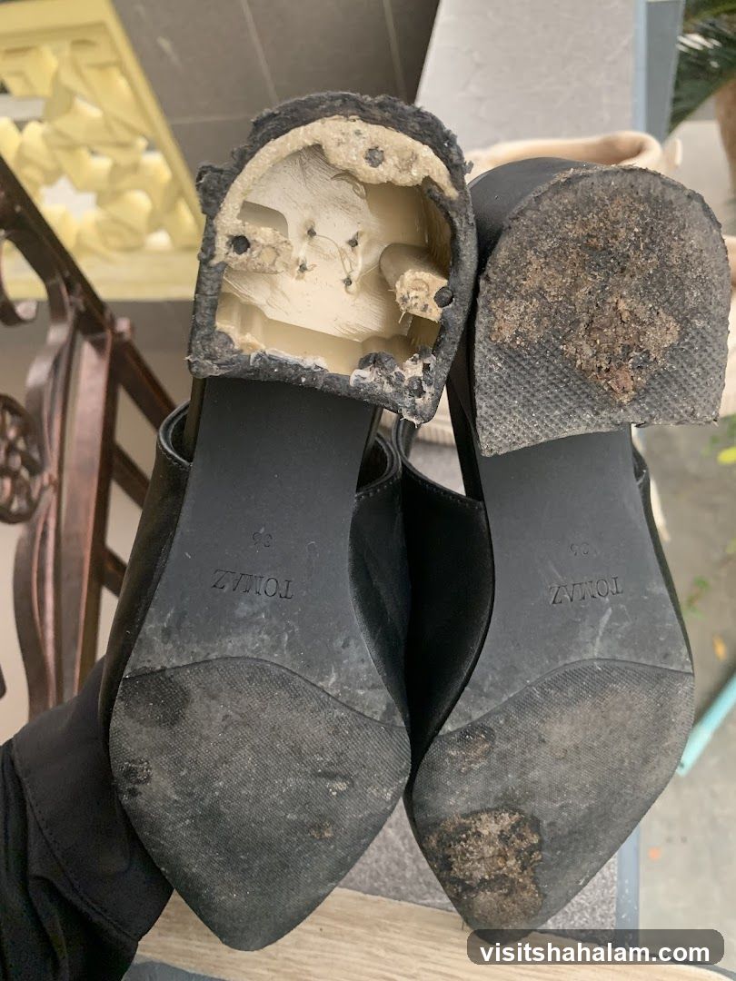 Damaged Black Heels