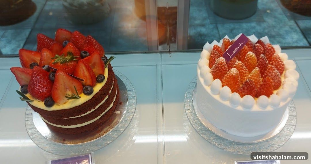 Two Cakes in a Display Case