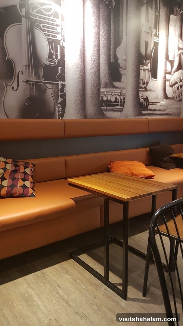 Modern Seating Area with Musical Instrument Mural