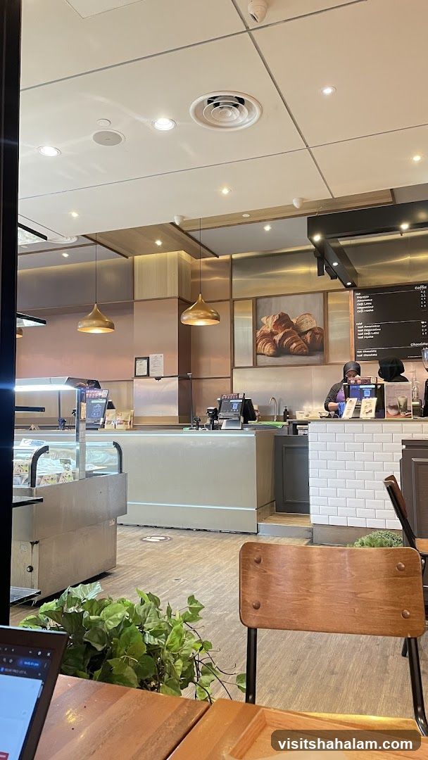 Cafe Interior with Croissant Art