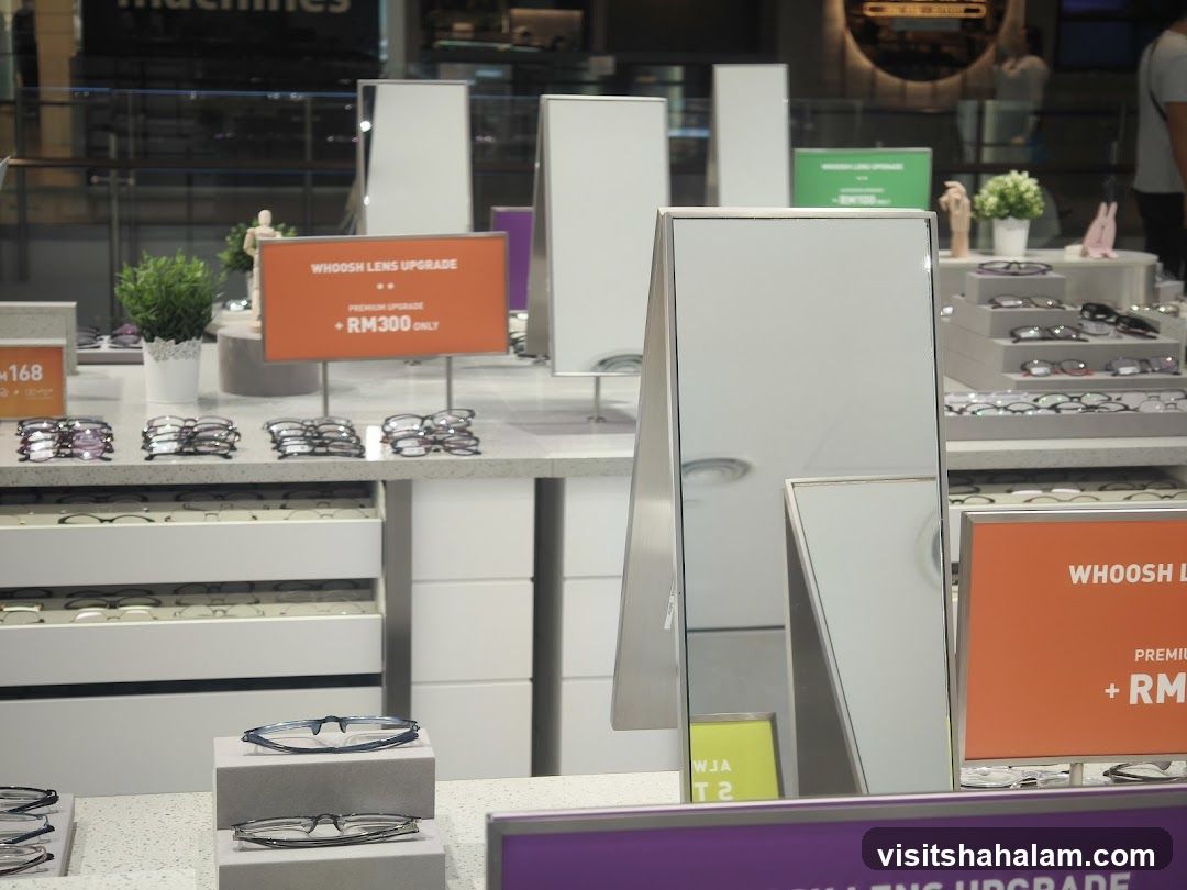 Eyewear display with promotional signs