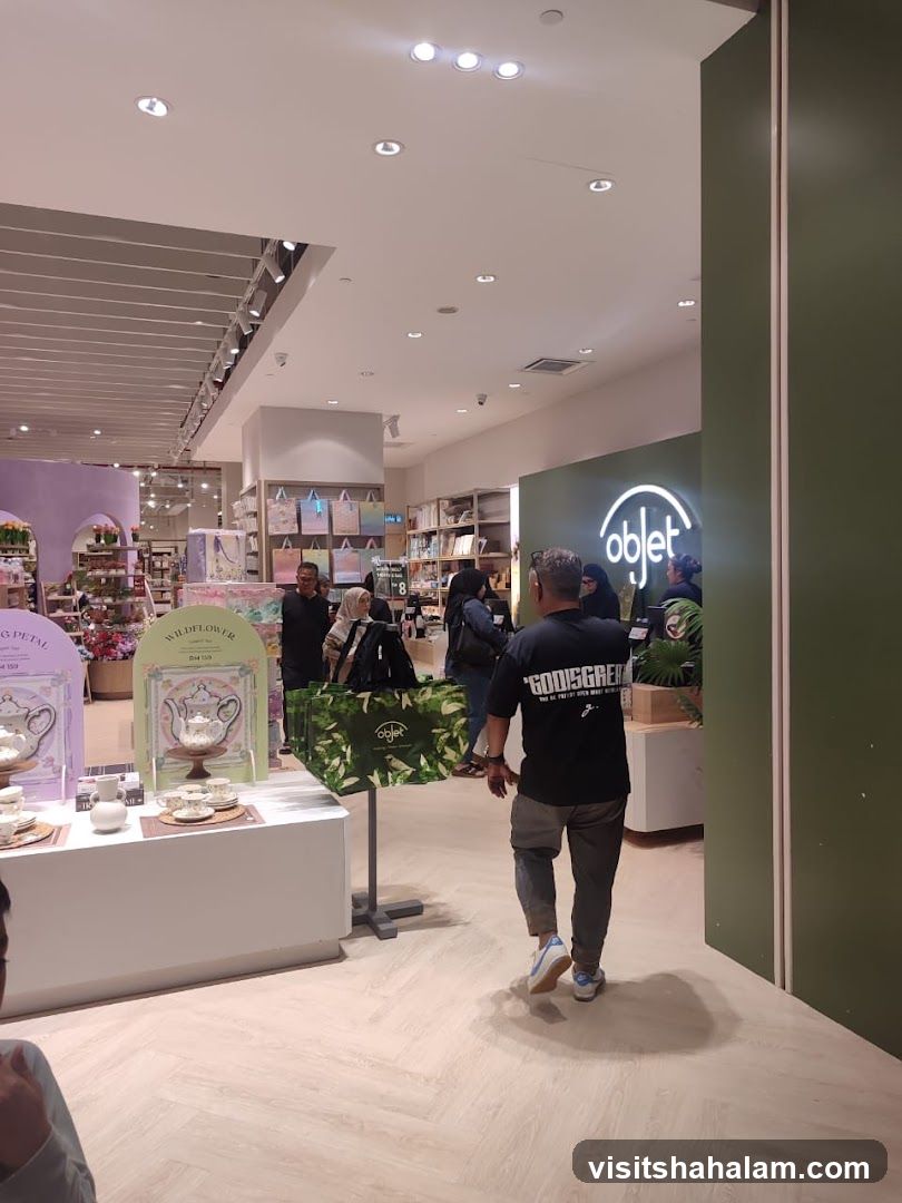 Interior of a store with displays and shoppers