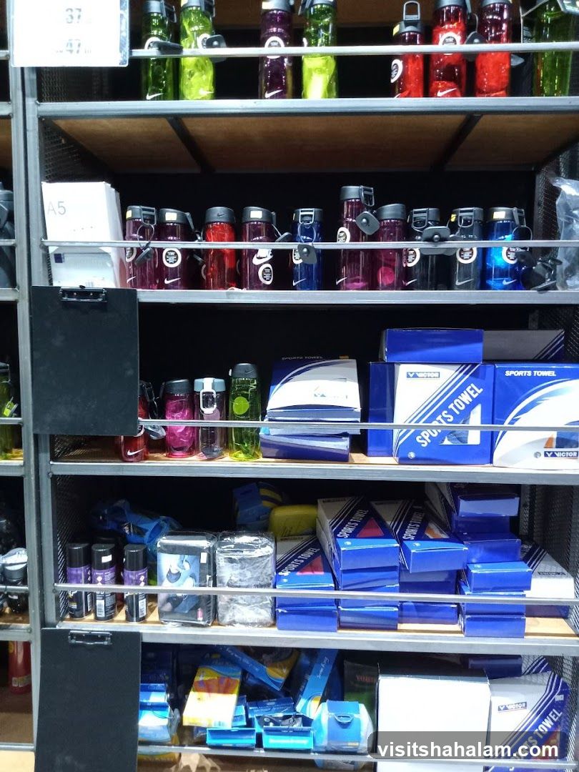 Sports Bottles and Towels on Shelves