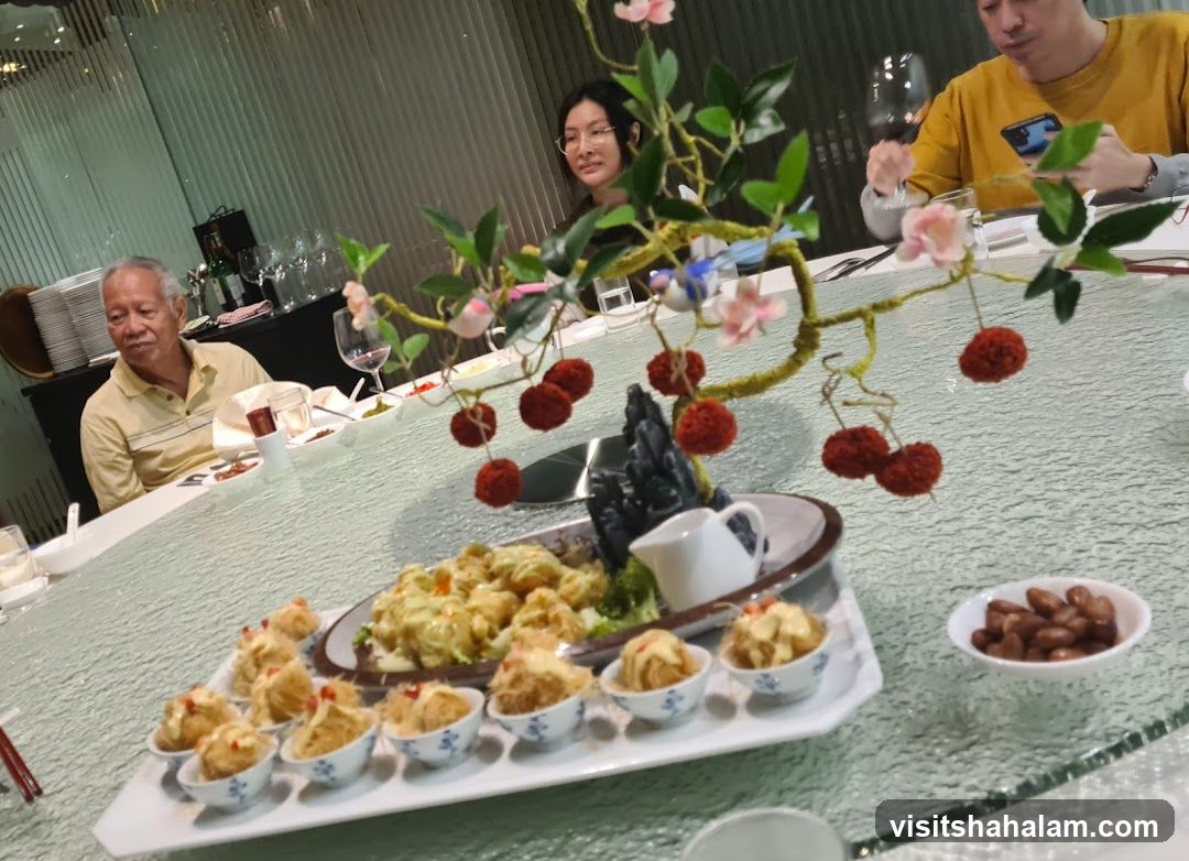 Diners at a table with food
