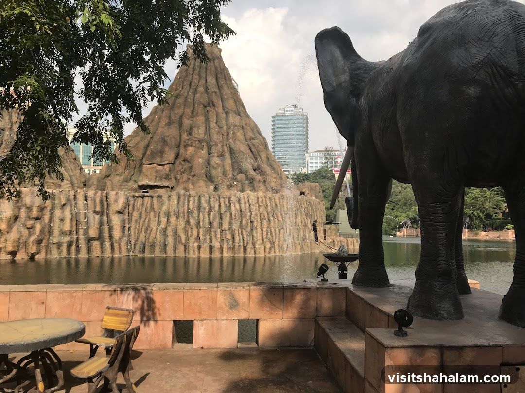 Elephant statue and artificial volcano