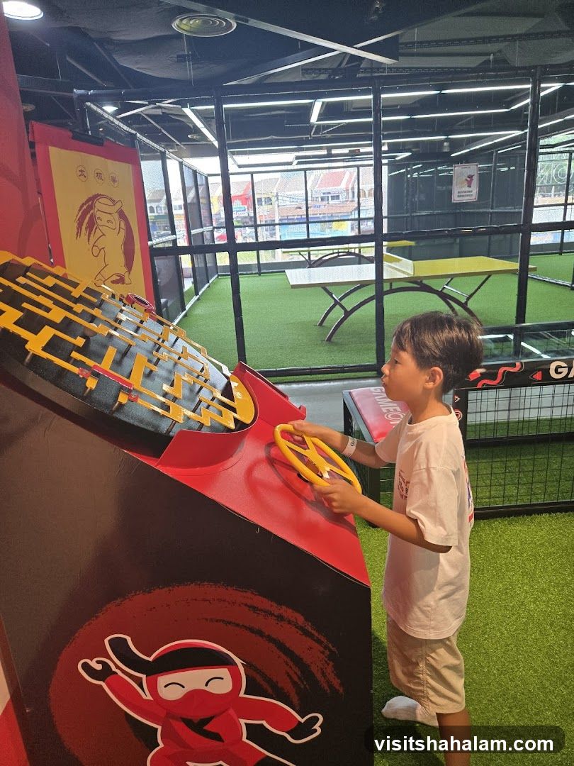 Child Playing an Arcade Game