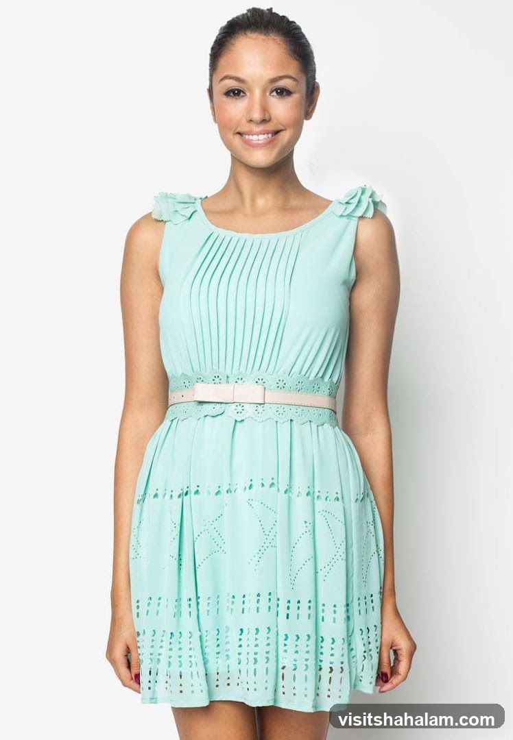 Woman in a mint green dress