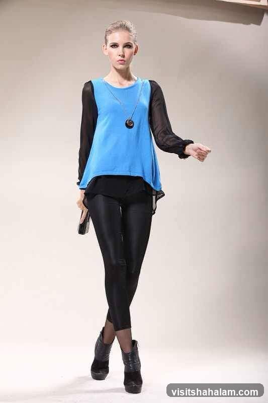 Woman in Blue and Black Outfit