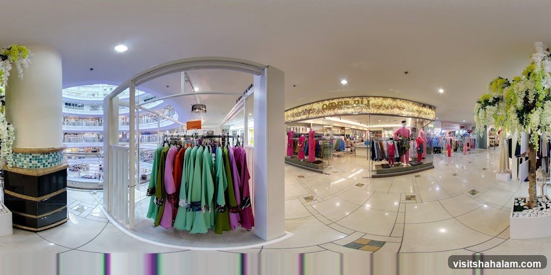 Clothing store interior with mannequins and racks of garments
