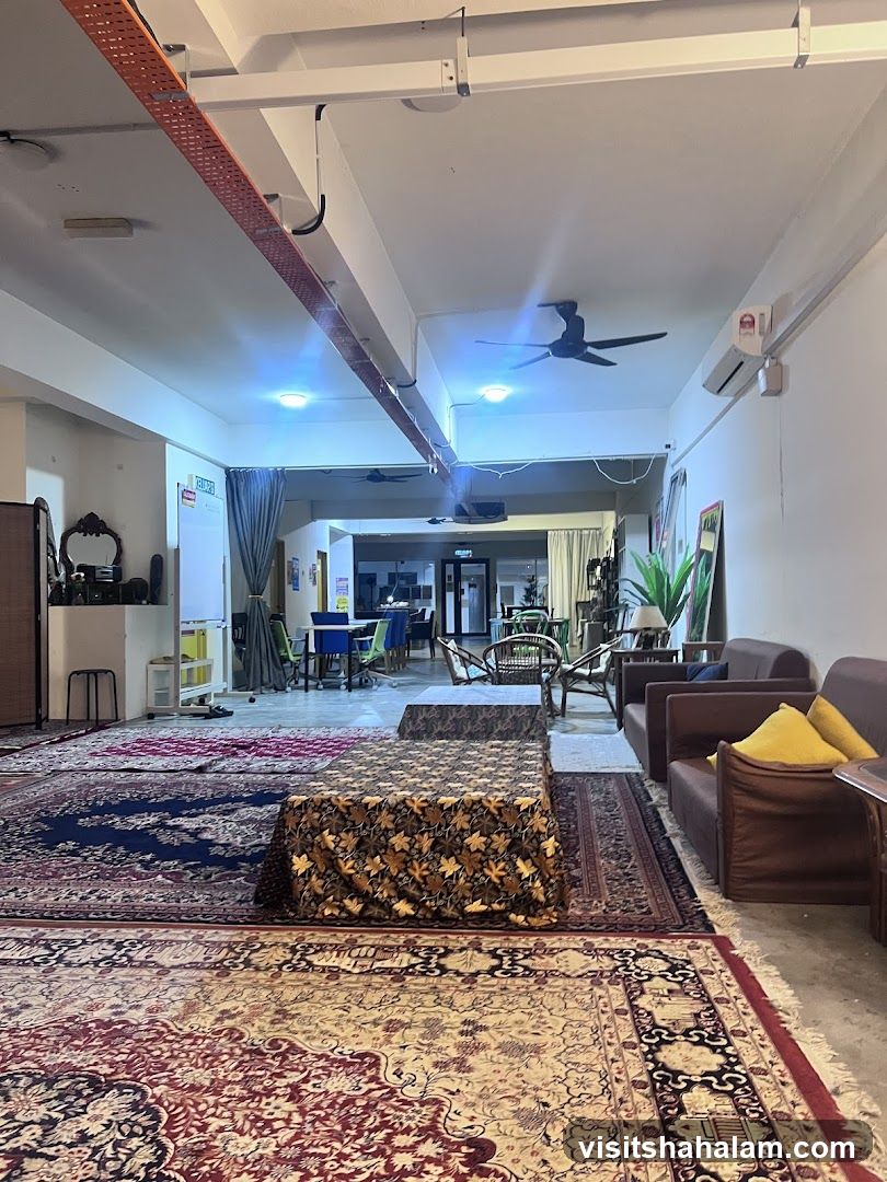 Interior of a lounge area with Persian rugs and seating