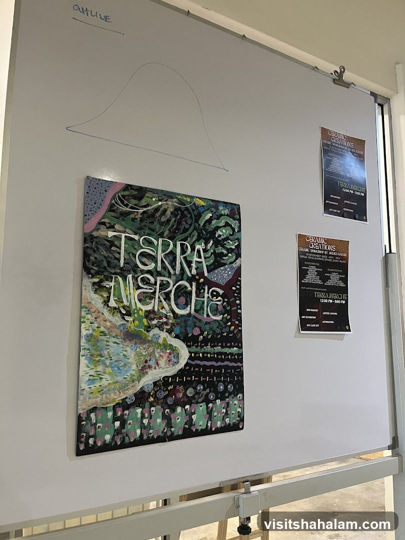 Whiteboard with artwork and flyers