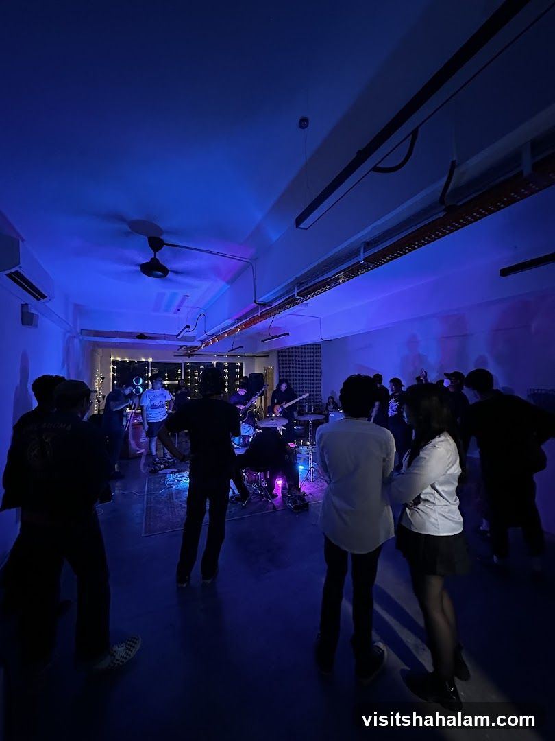 Band performing in a dimly lit room