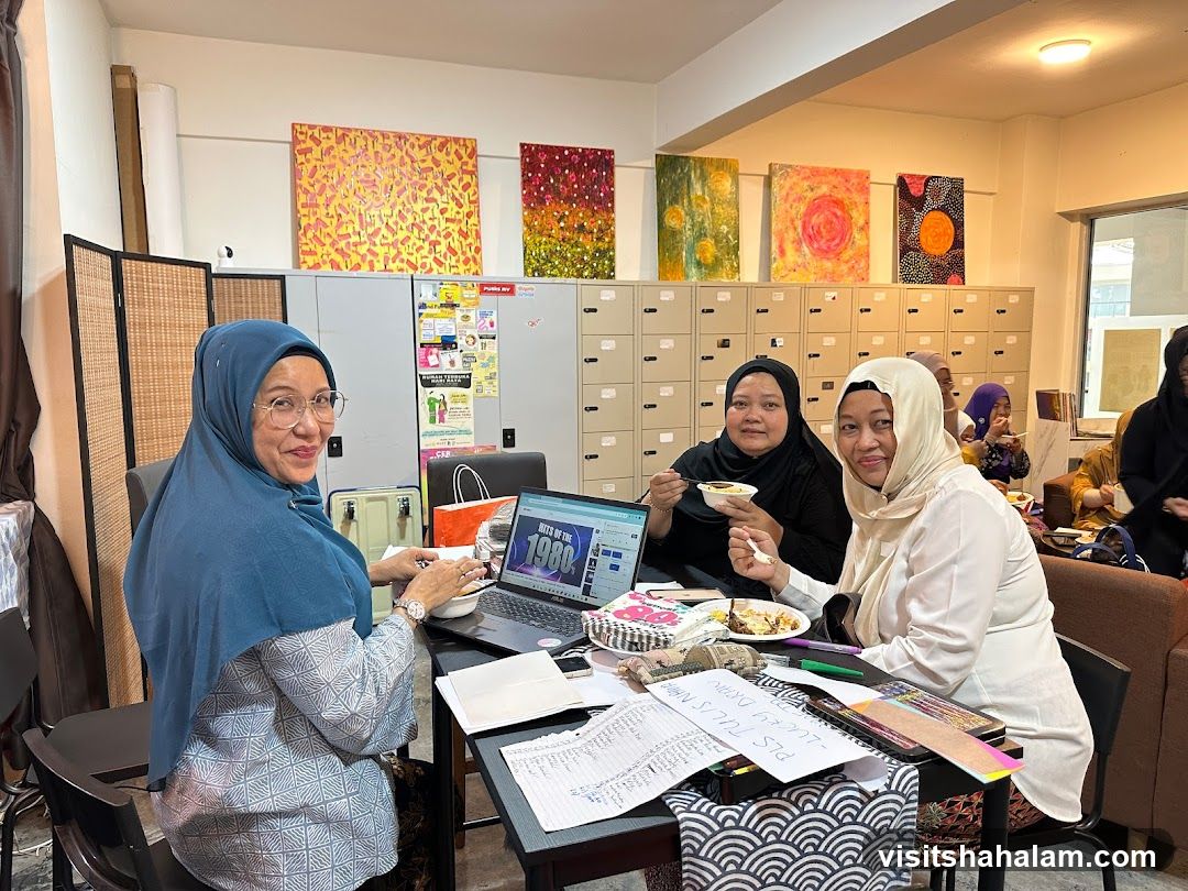 Women enjoying a meal and working