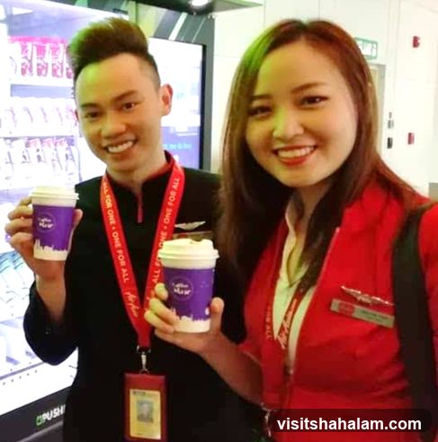 Two people holding coffee cups