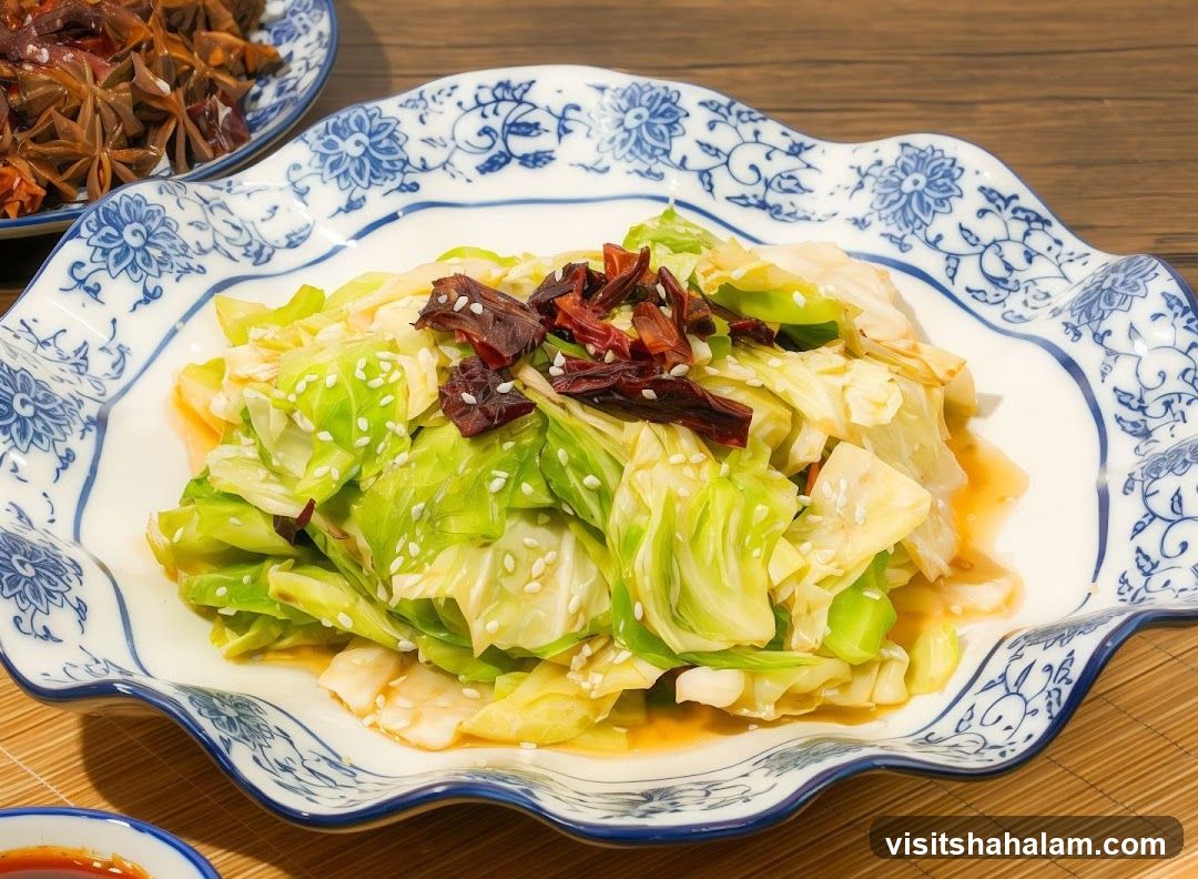 Stir-fried Cabbage with Dried Chilies and Sesame Seeds