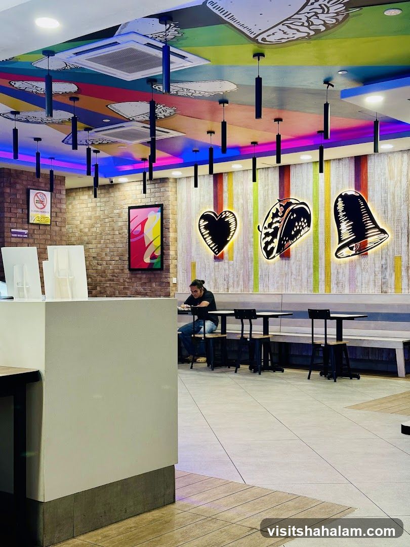 Restaurant Interior with Colorful Ceiling and Taco Art