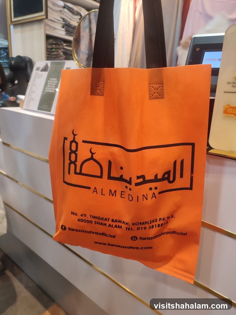 Orange Tote Bag with Arabic and English Text