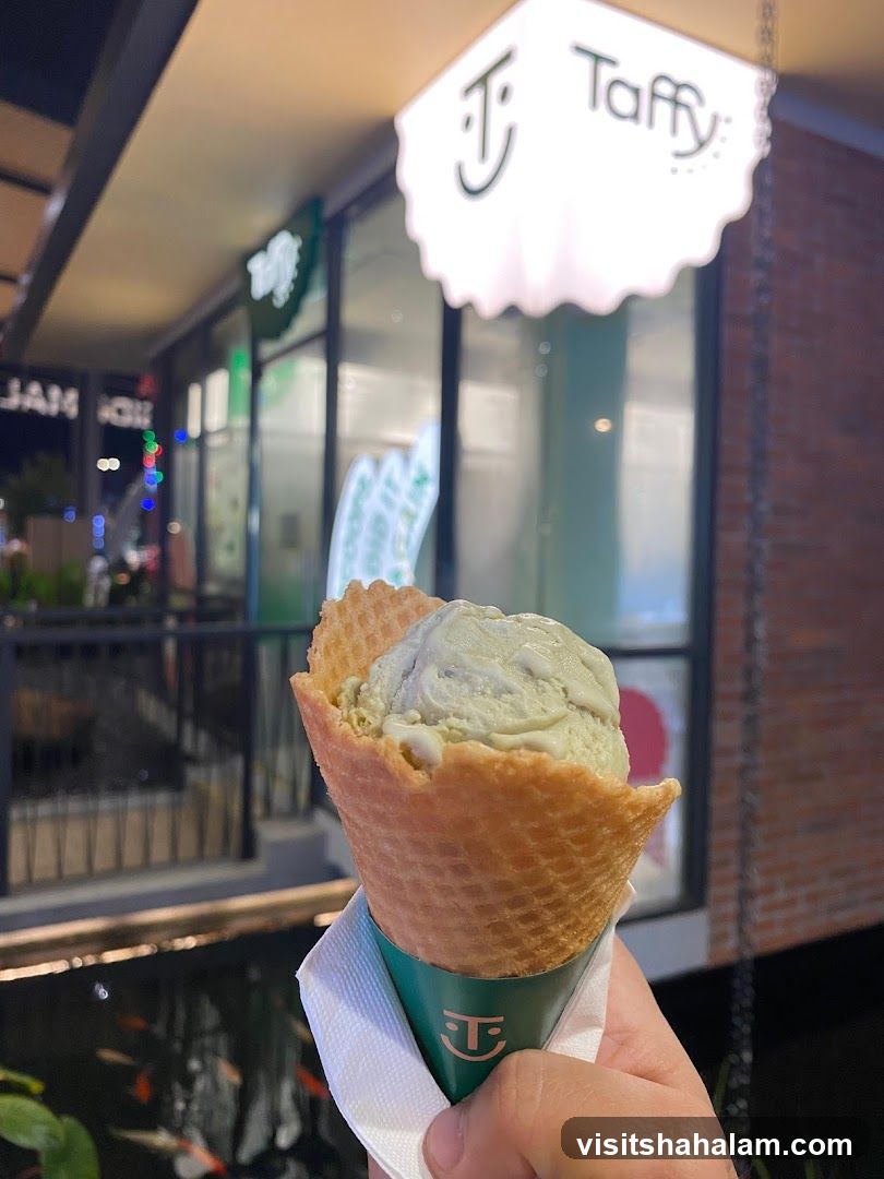 Ice Cream Cone in Front of Taffy Store