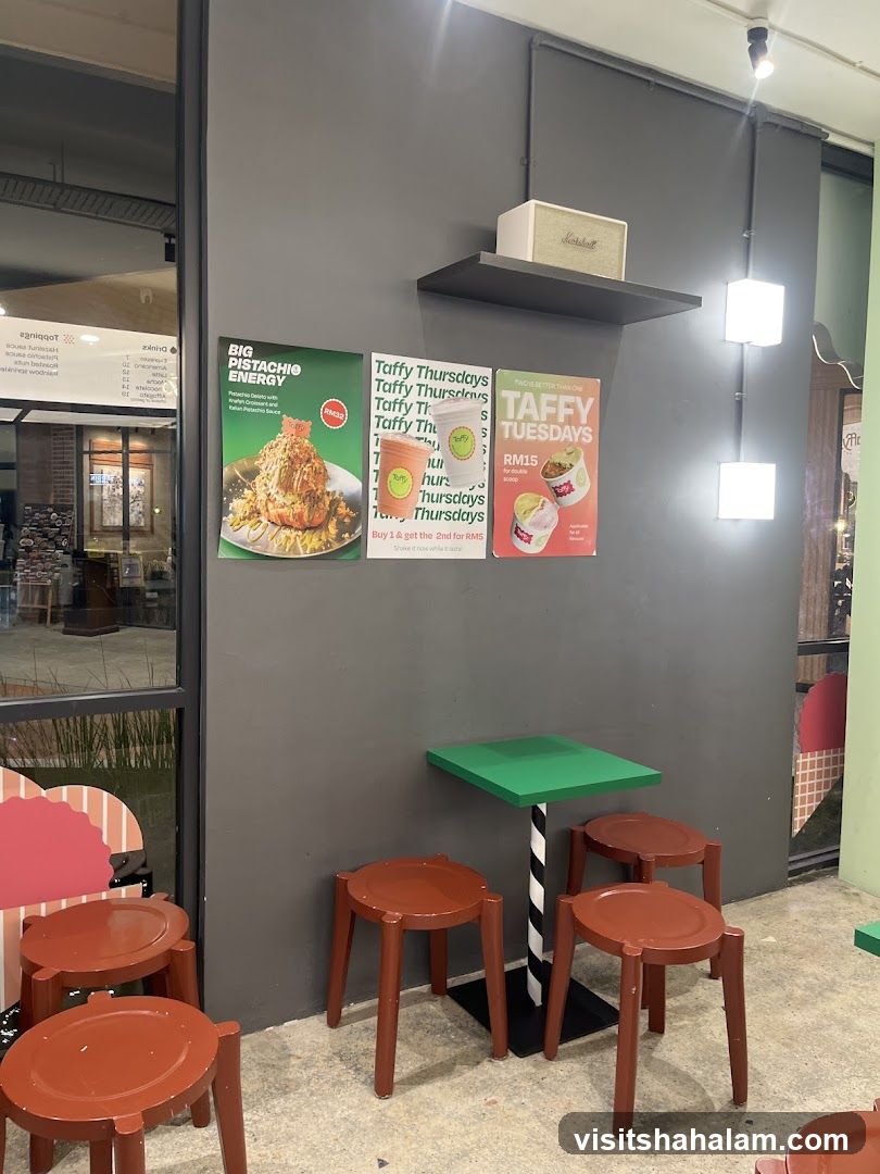 Promotional posters and seating area