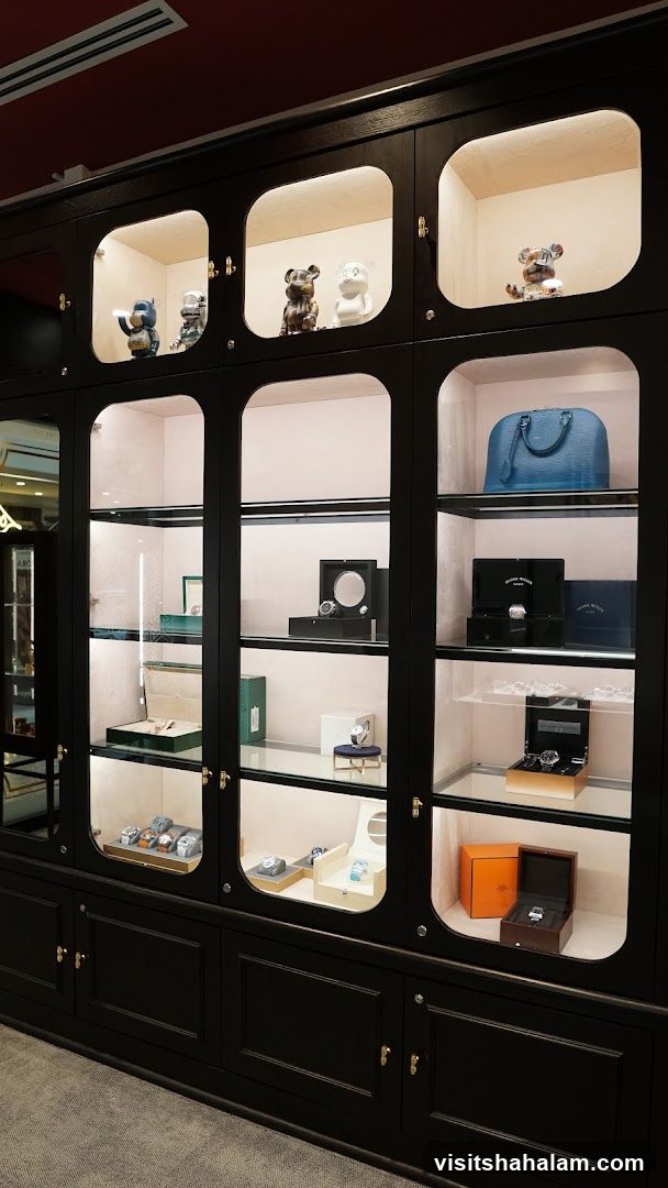 Display Cabinet with Watches and Collectibles