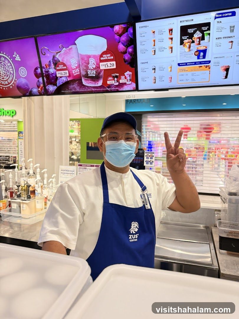 Barista Posing with Peace Sign
