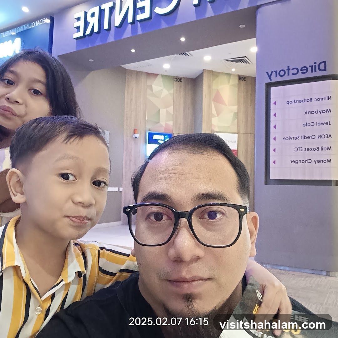 Family Selfie at a Mall Directory
