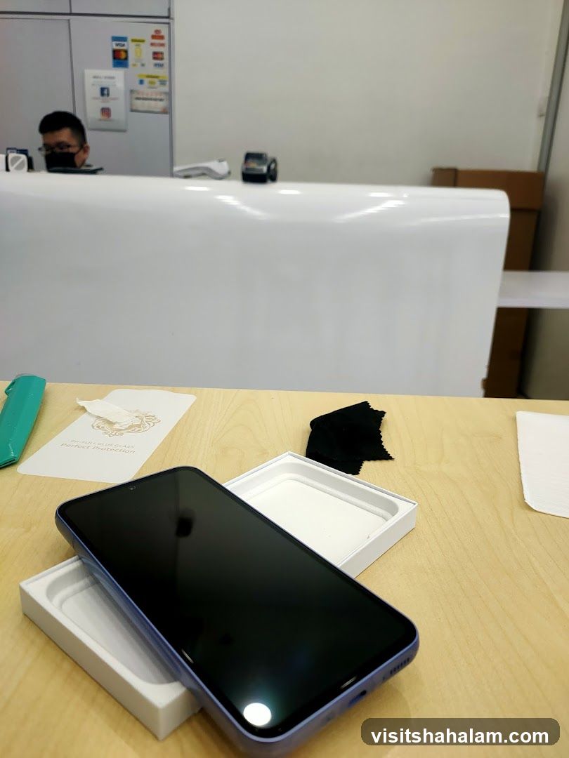 Phone and Accessories on Counter