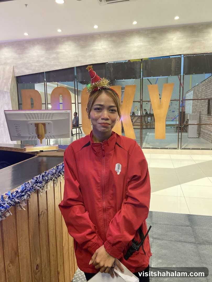 Woman in Red Jacket with Christmas Hat