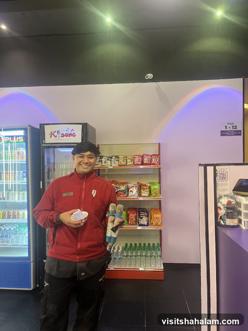 Staff Member with Microphones and Snacks