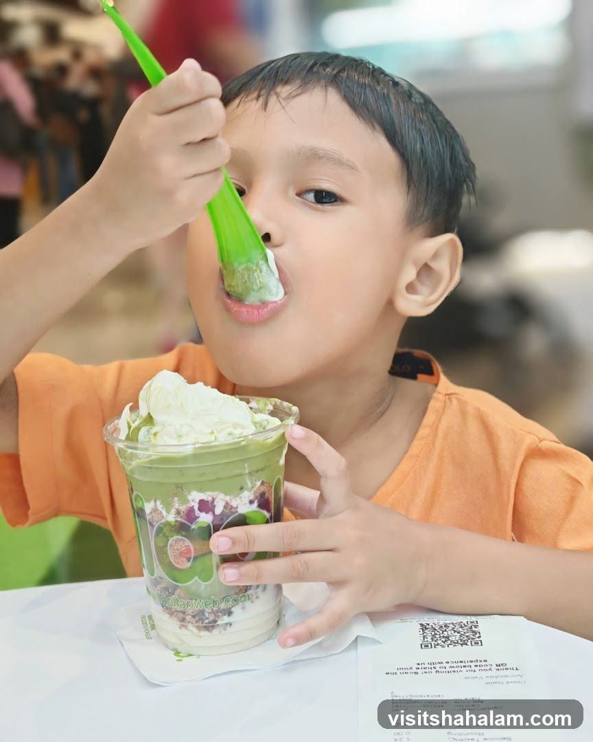 Boy Eating a Dessert