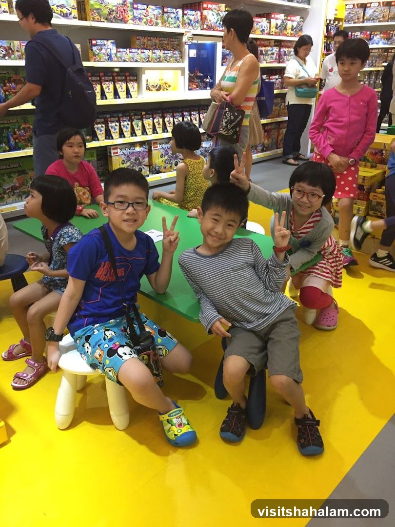 Children posing in a toy store