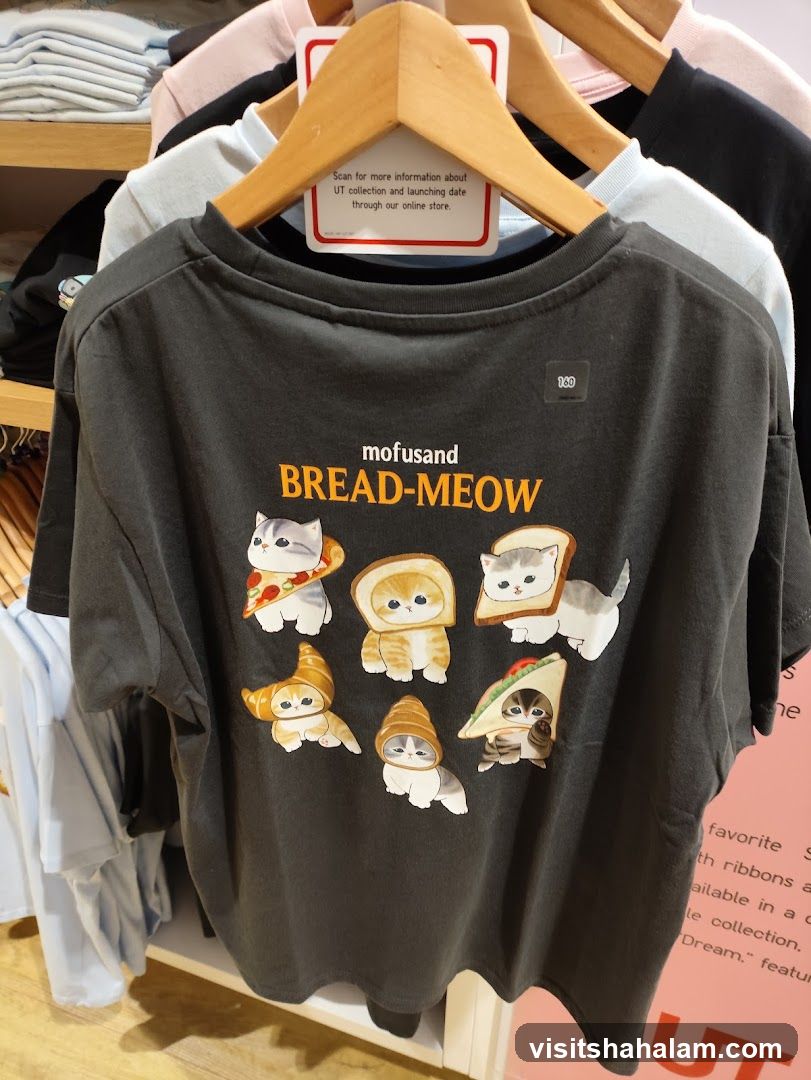 T-shirt with cat and bread graphic