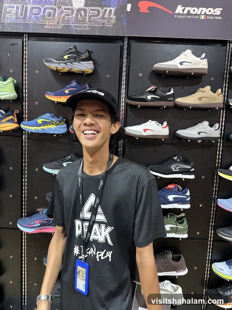Man in front of shoe display