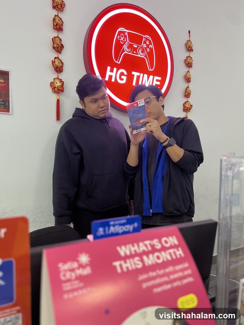 Two men looking at a game case