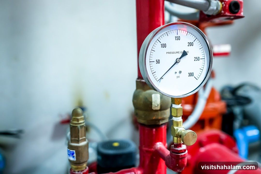 Pressure Gauge on Red Pipes