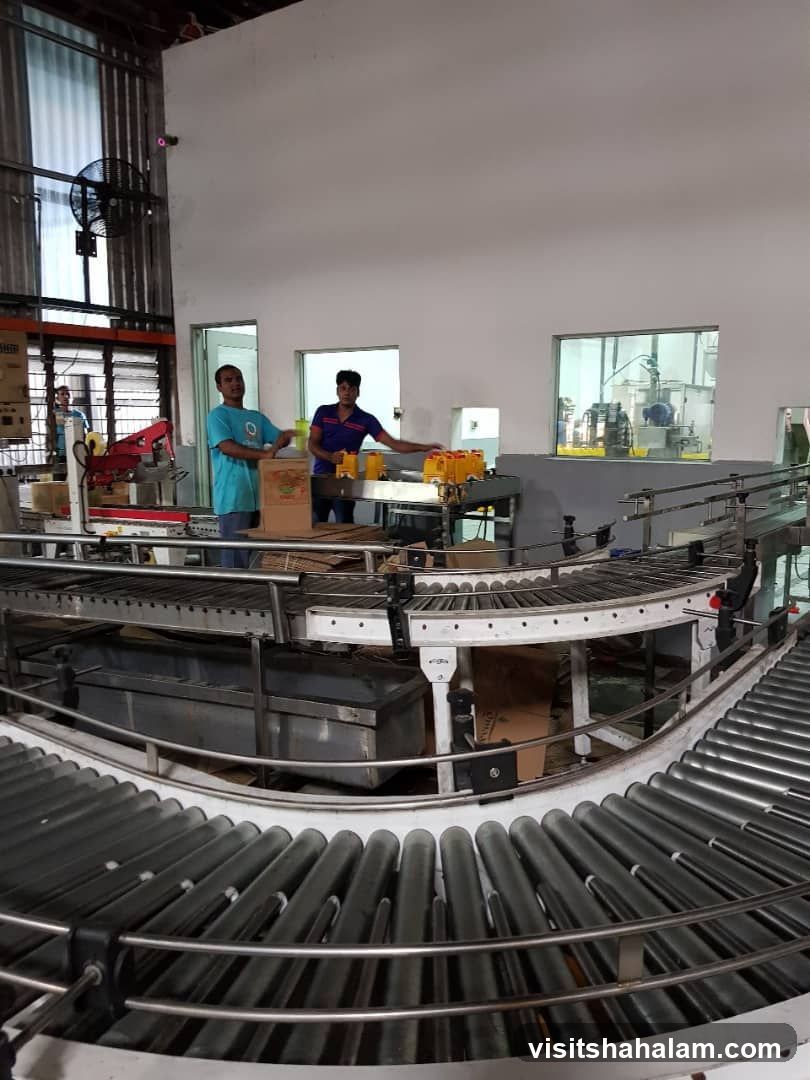 Factory workers and conveyor belts
