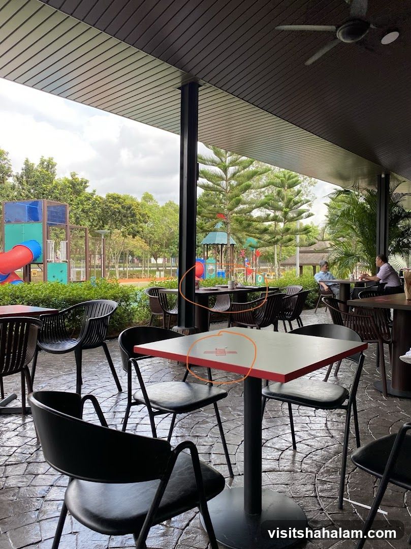 Outdoor Seating Area with Playground View