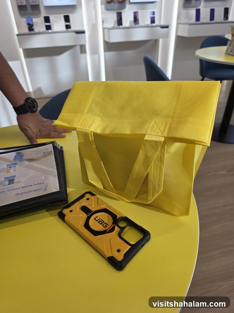 Yellow shopping bag and phone case on a table