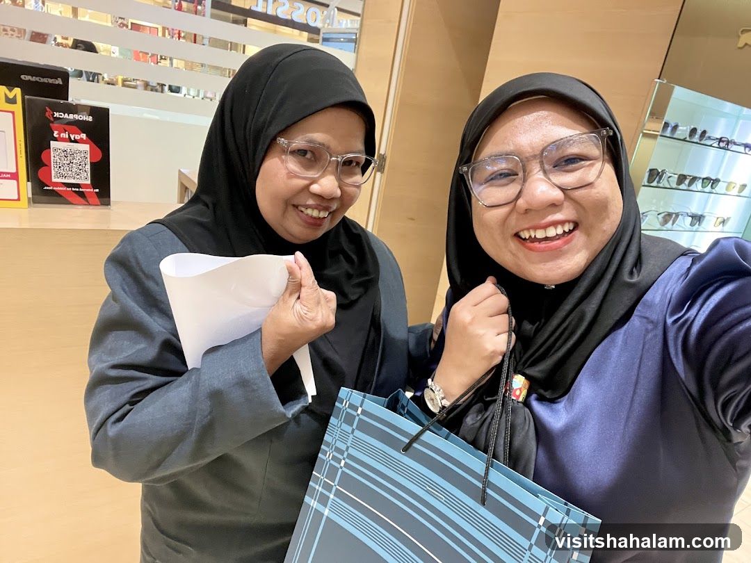 Two women smiling in a store