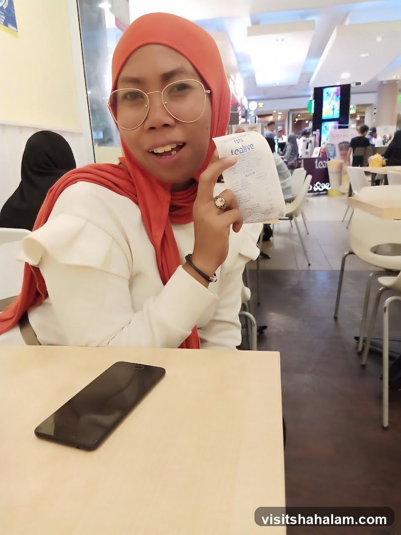 Woman holding a receipt