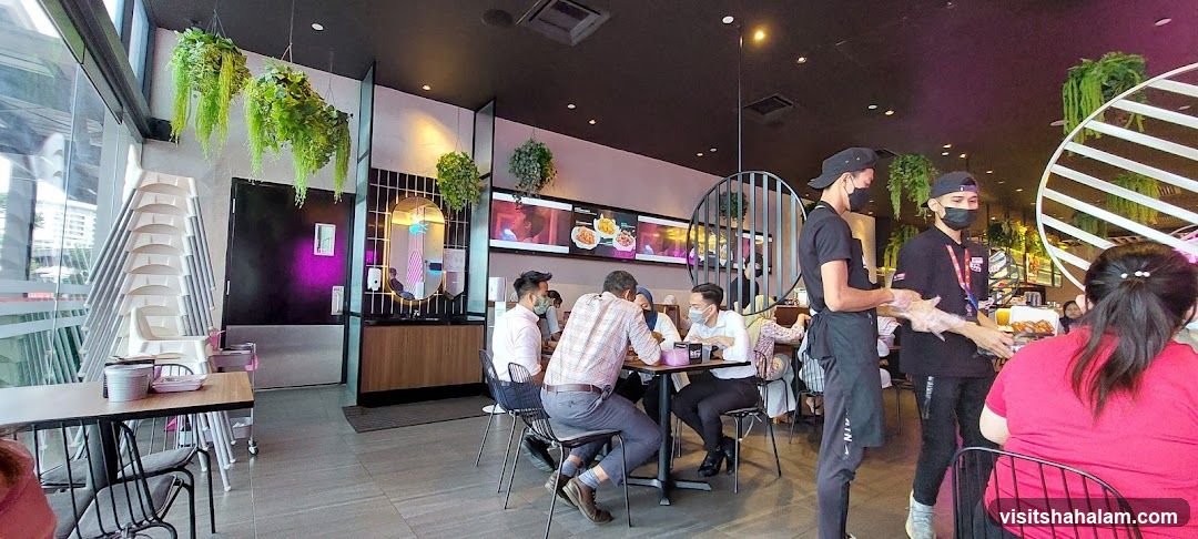 Restaurant Interior with Diners and Staff