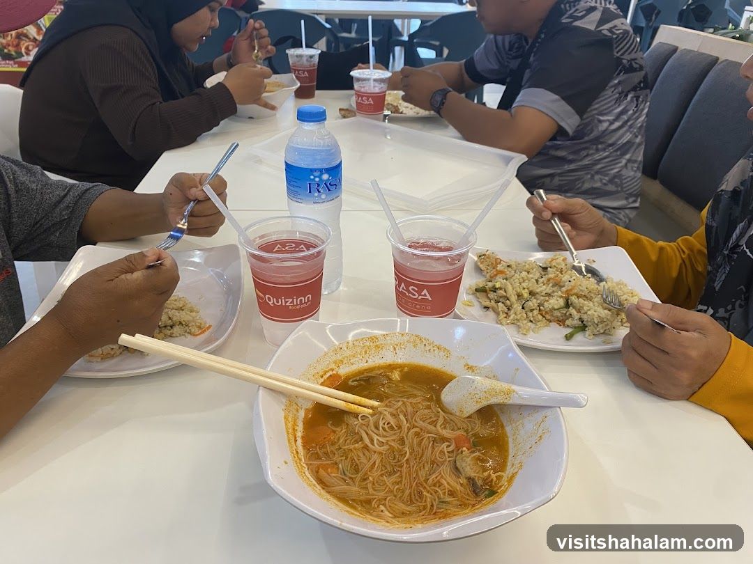People eating at a food court