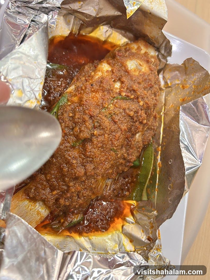 Fish in foil with sauce