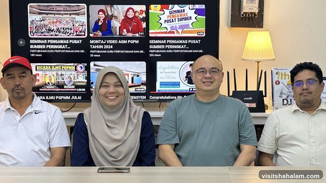 Group Photo with YouTube Videos Displayed