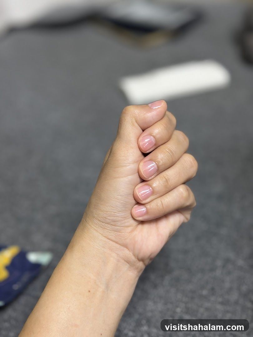 Hand with Sheer Pink Nails