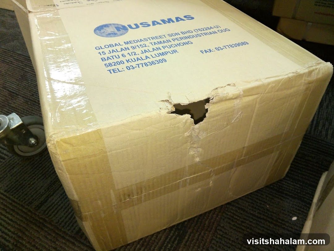 Damaged Cardboard Box