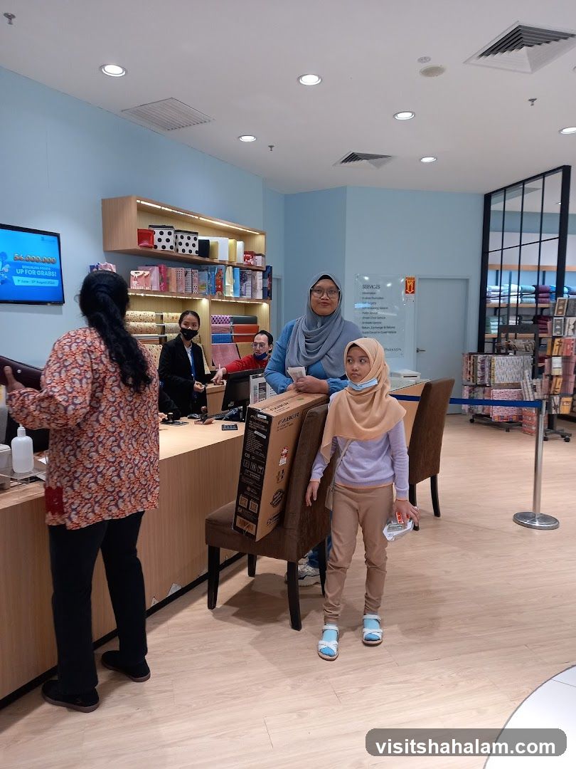 People at a counter in a store