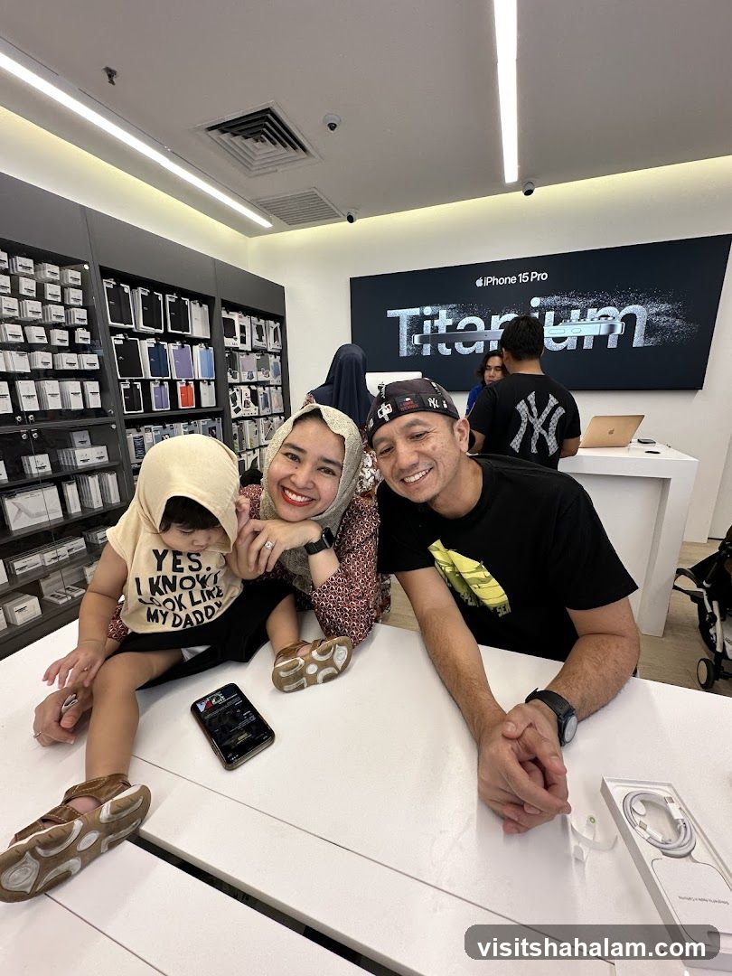 Family Posing in Electronics Store