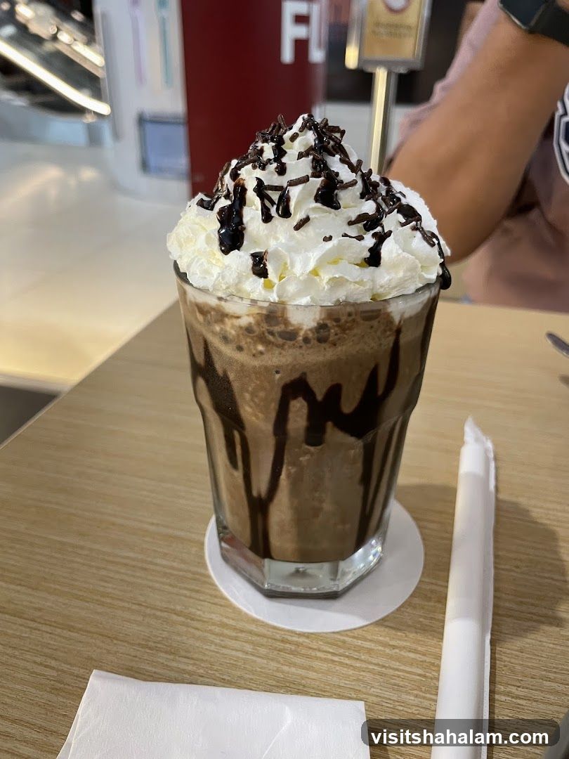 Chocolate Frappe with Whipped Cream and Sprinkles