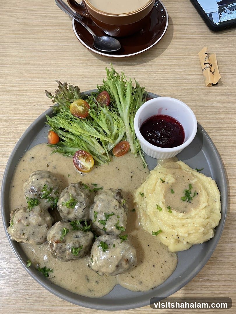 Meatballs with Mashed Potatoes and Salad